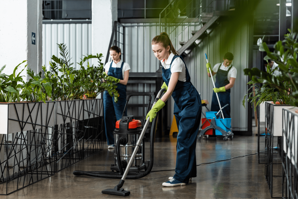A man cleaning the office
